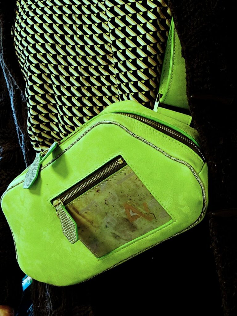 Gitte Next bespoke belt bag worn at the waist or crossbody — light green veg-tan leather — gold hardware — Brussels